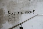Eat the Rich, Graffiti in a stairwell - Claudio Schwarz - Unsplash