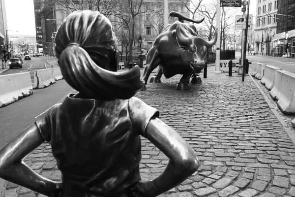 Girl Faces the Wall Street Bull - Daniel Lloyd Blunk Fernandez, Unsplash